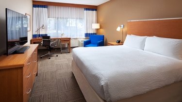 A comfortable, light guest room